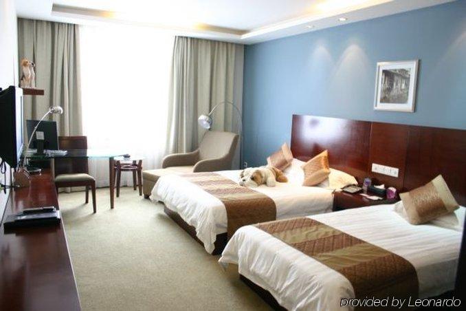 Suzhou Taoyuan International Holiday Hotel Zimmer foto