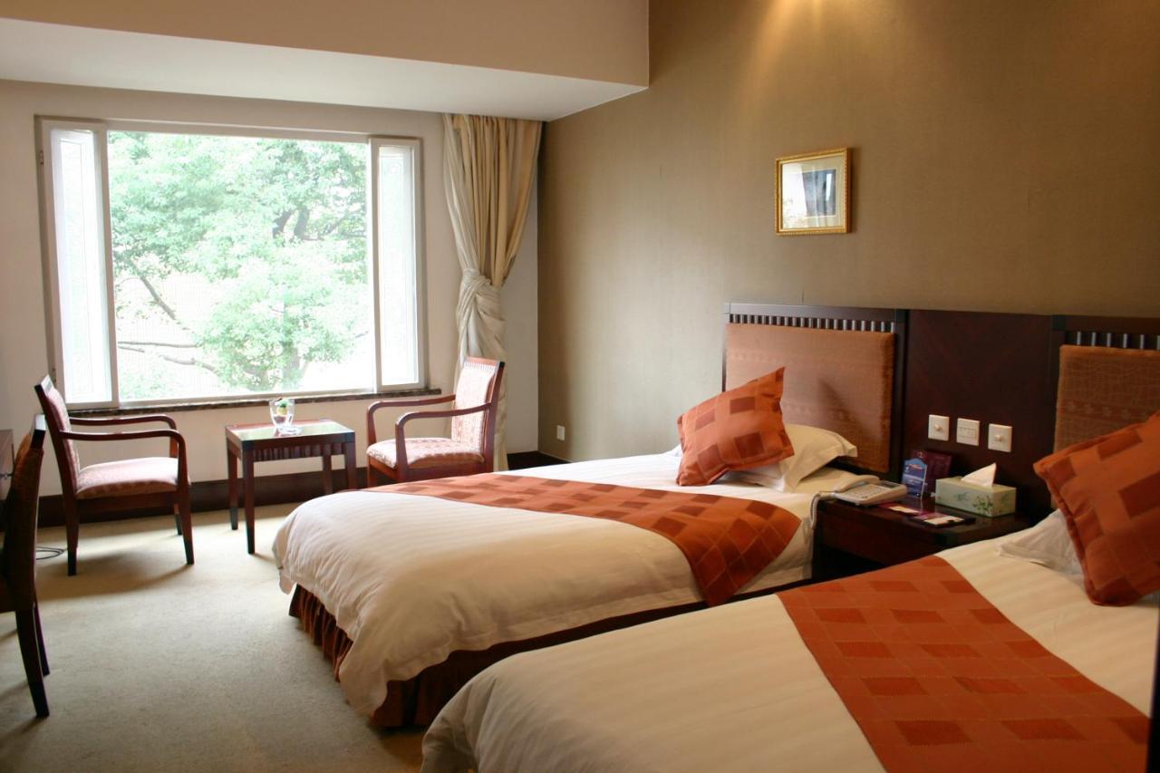 Suzhou Taoyuan International Holiday Hotel Zimmer foto